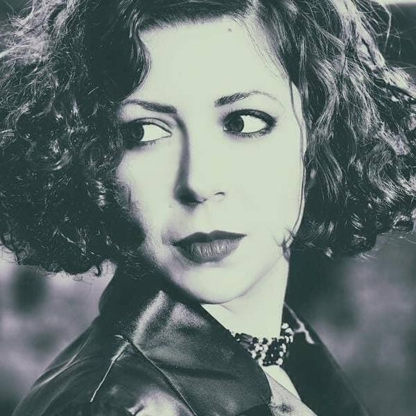 Maira Melchionda — dramatic black and white close-up portrait