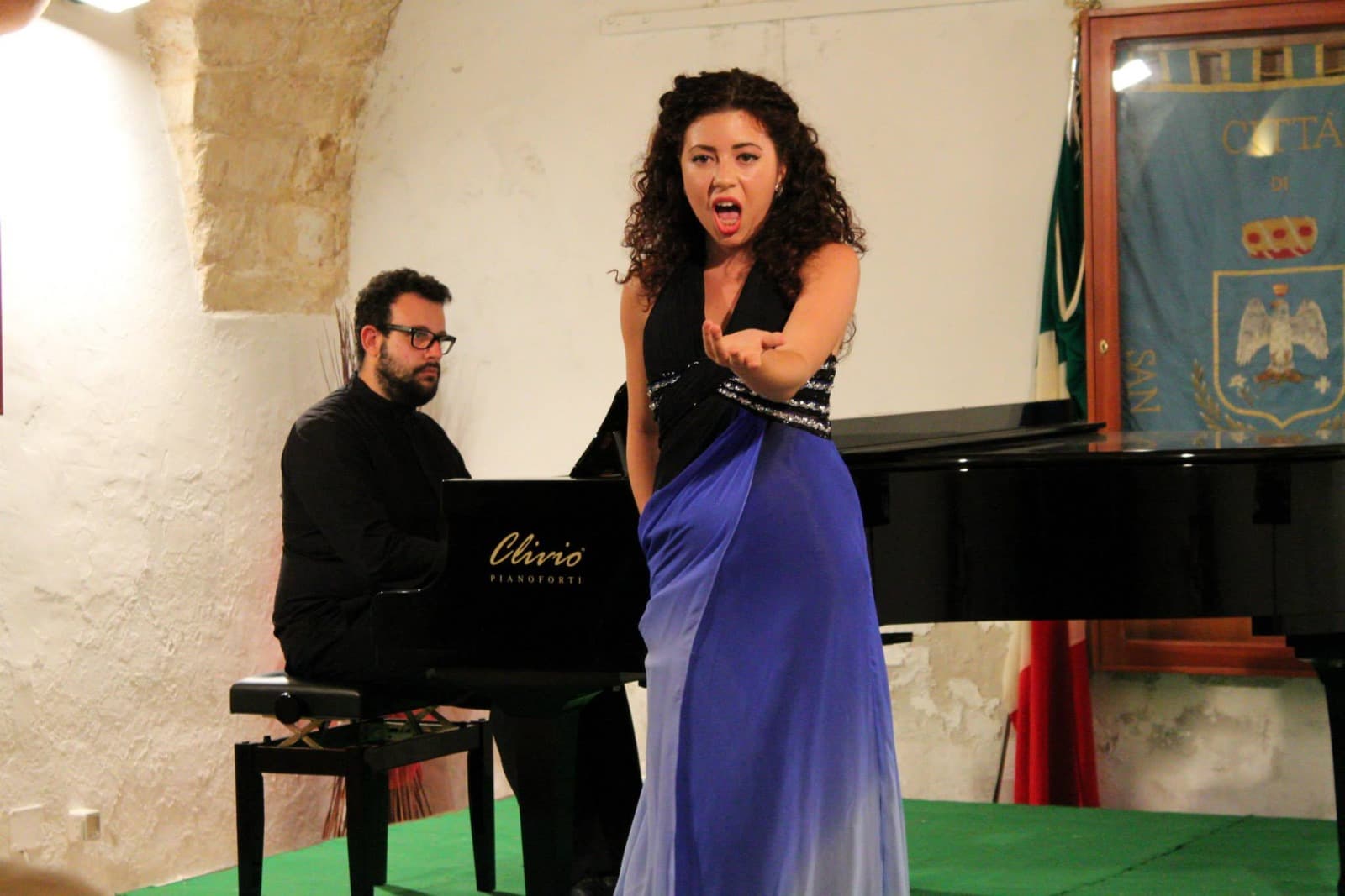 Maira Opera performing in an Italian hall